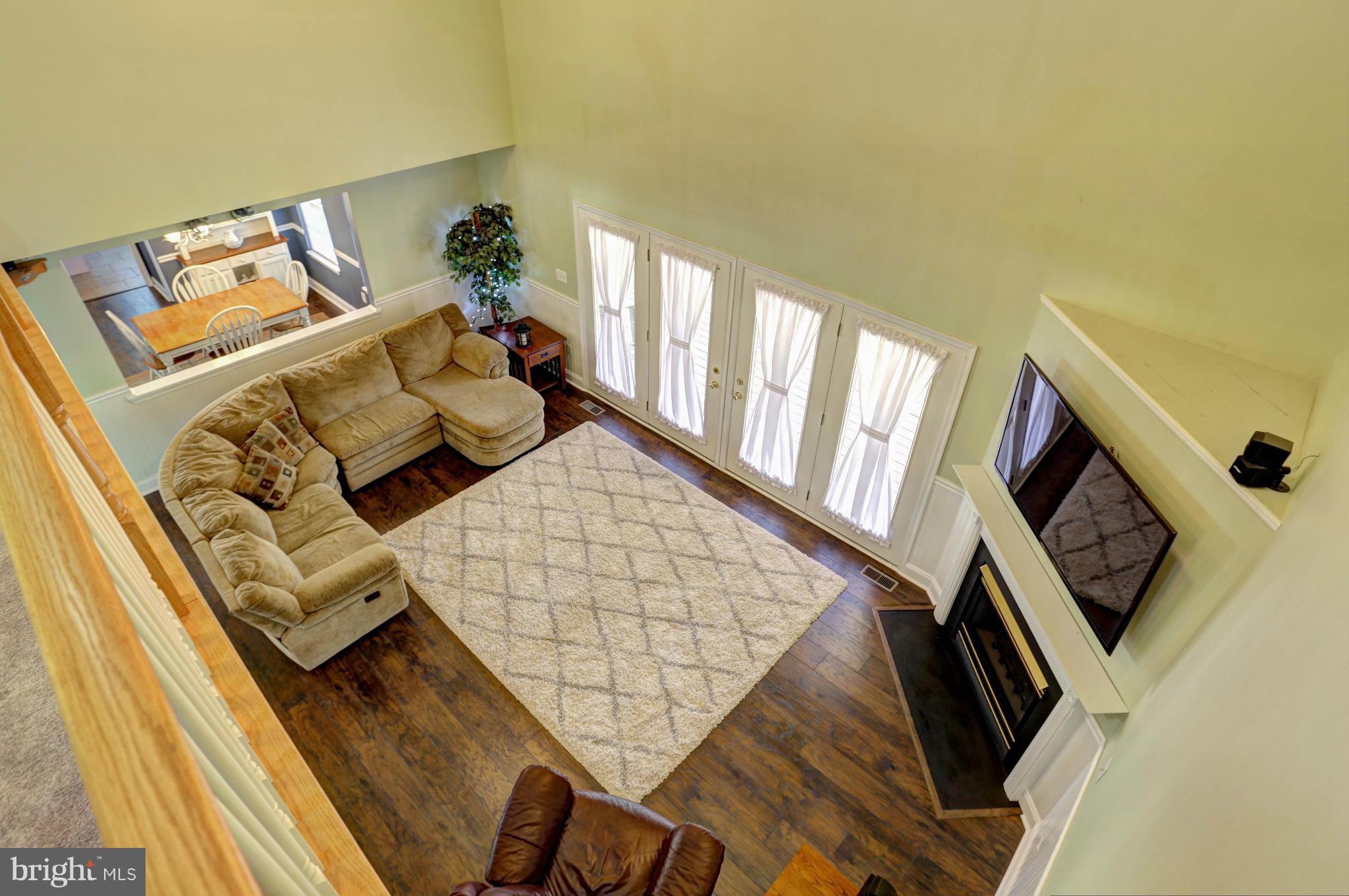 1700 Perry Cove Road Pasadena, MD 21122 - Photo 19 of 30 INVITING 2 STORY FAMILY ROOM