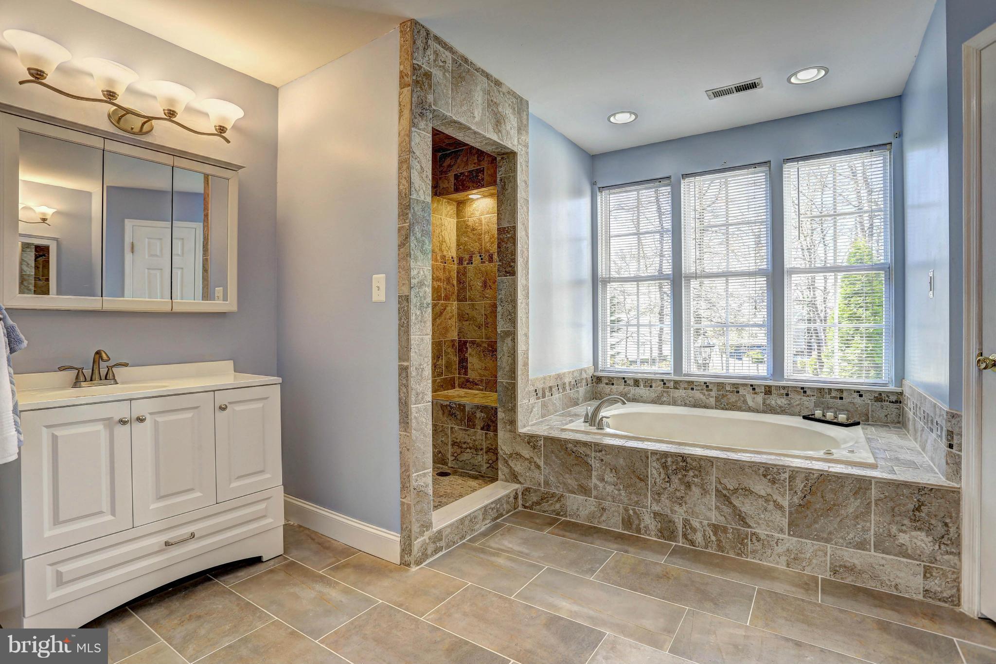 1700 Perry Cove Road Pasadena, MD 21122 - Photo 21 of 30 MASTER BATH, HIS & HER SINK, STAND UP SHOWER
