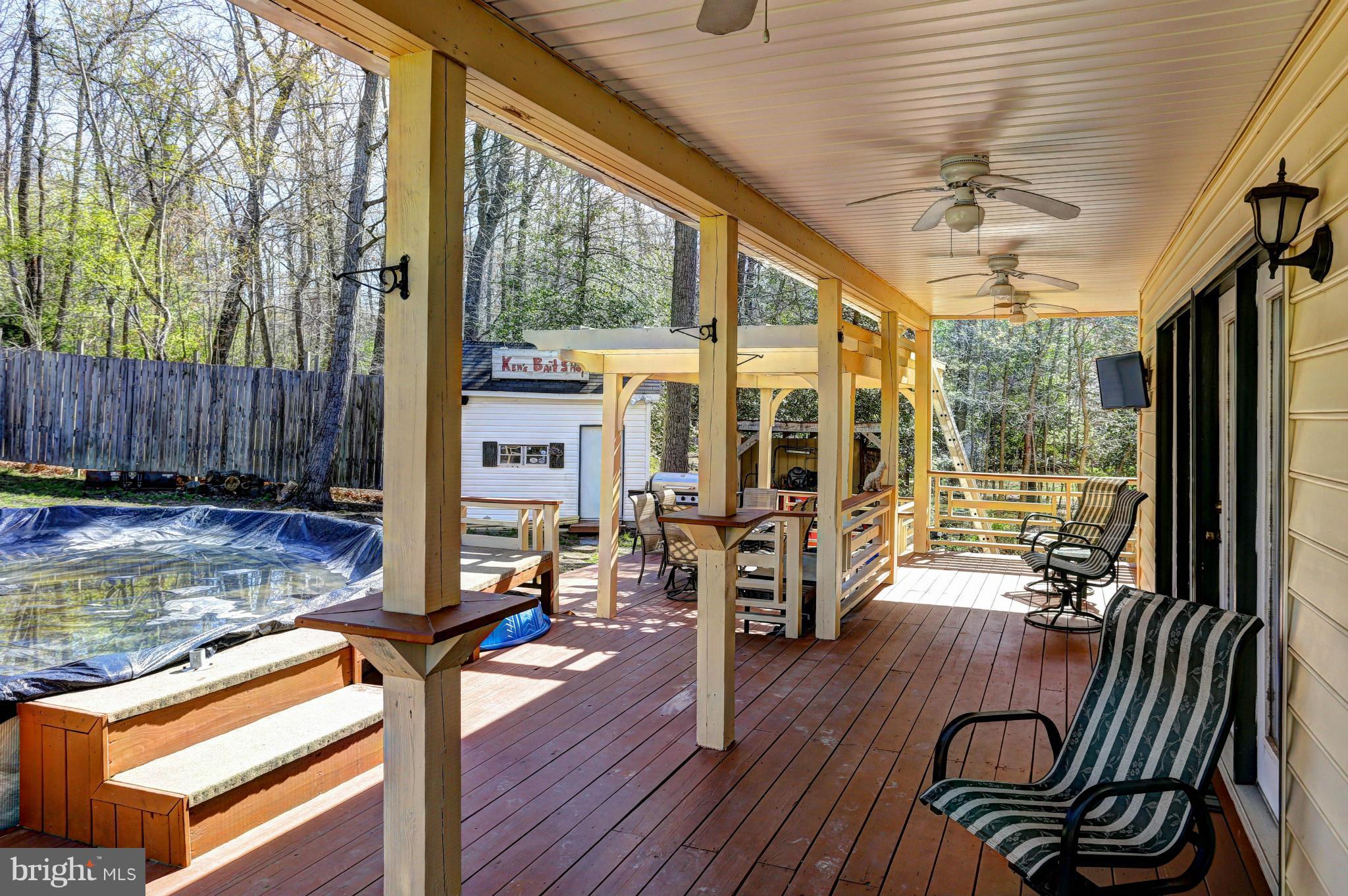 1700 Perry Cove Road Pasadena, MD 21122 - Photo 29 of 30 COVERED BACK PORCH & POOL AREA