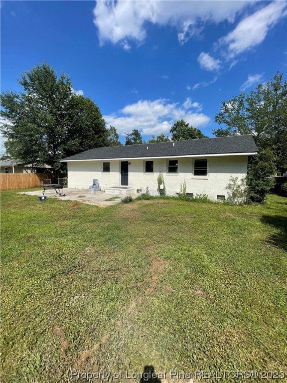 3013 Huntley Street Spring Lake, NC 28390 - Photo 8 of 8 a view of a house with a yard