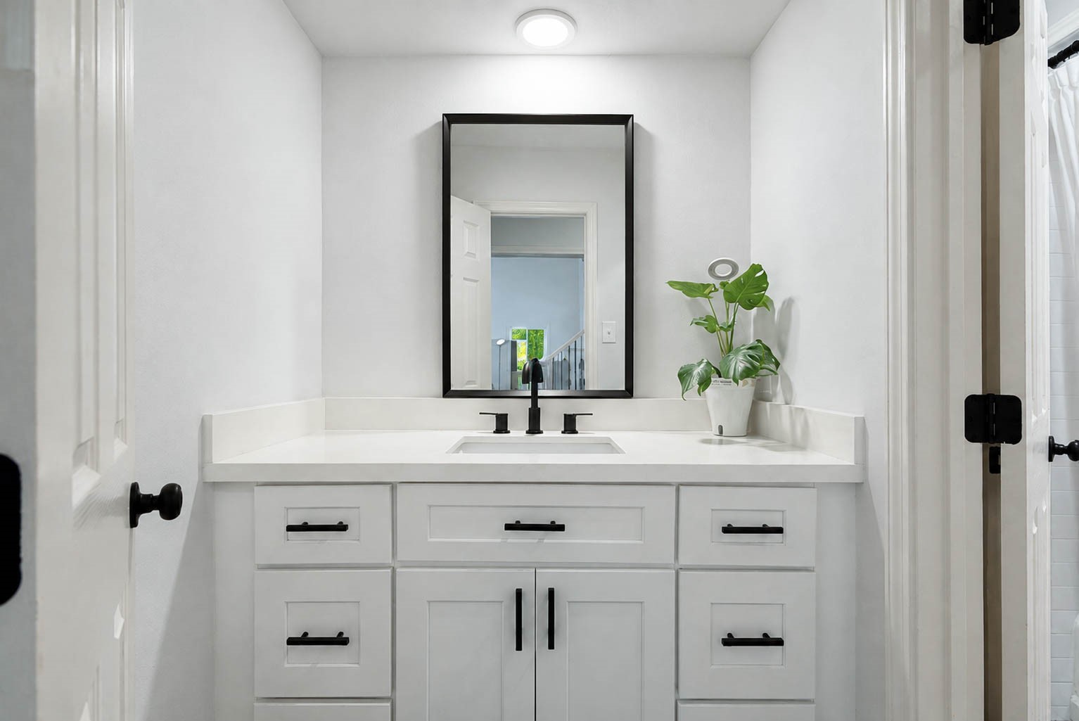 630 South Fry Road Katy, TX 77450 - Photo 33 of 48 Sleek bathroom featuring a modern shower-tub combo with elegant black fixtures and a stylish tiled niche for toiletries.