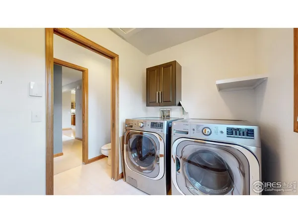 a en suite bathroom with a sink and a toilet