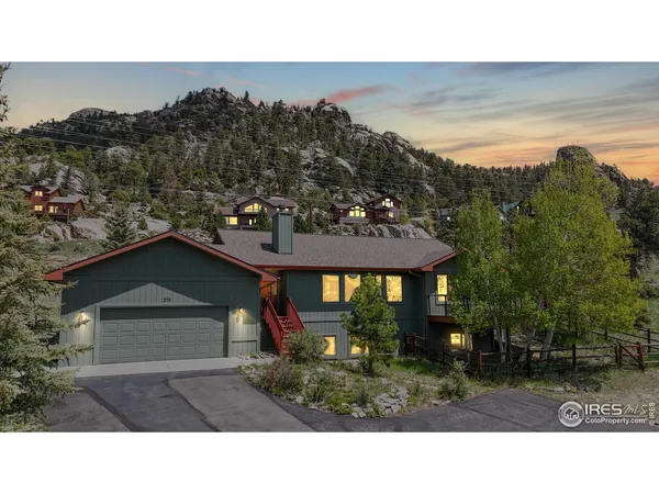 a black and white photo of a house