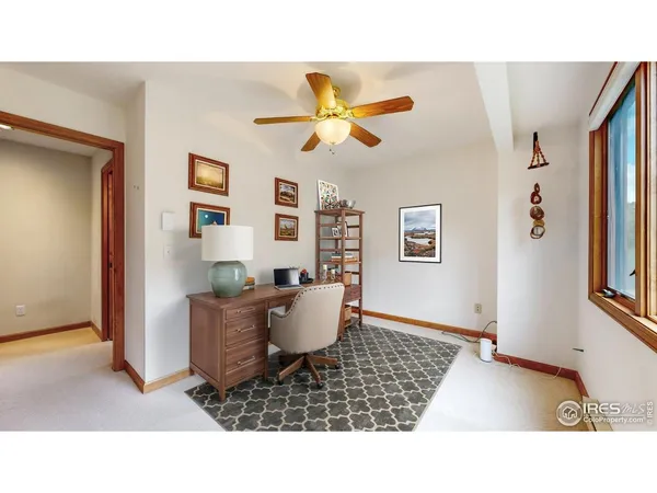 a living room with a couch and a dining table