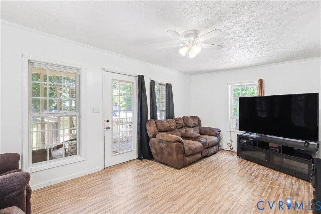 62 The Fls Road Victoria, VA 23974 - Photo 8 of 36 Spacious room featuring wood-finish flooring, whit