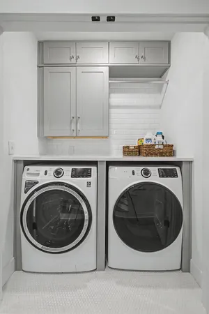 a utility room with a washer and dryer