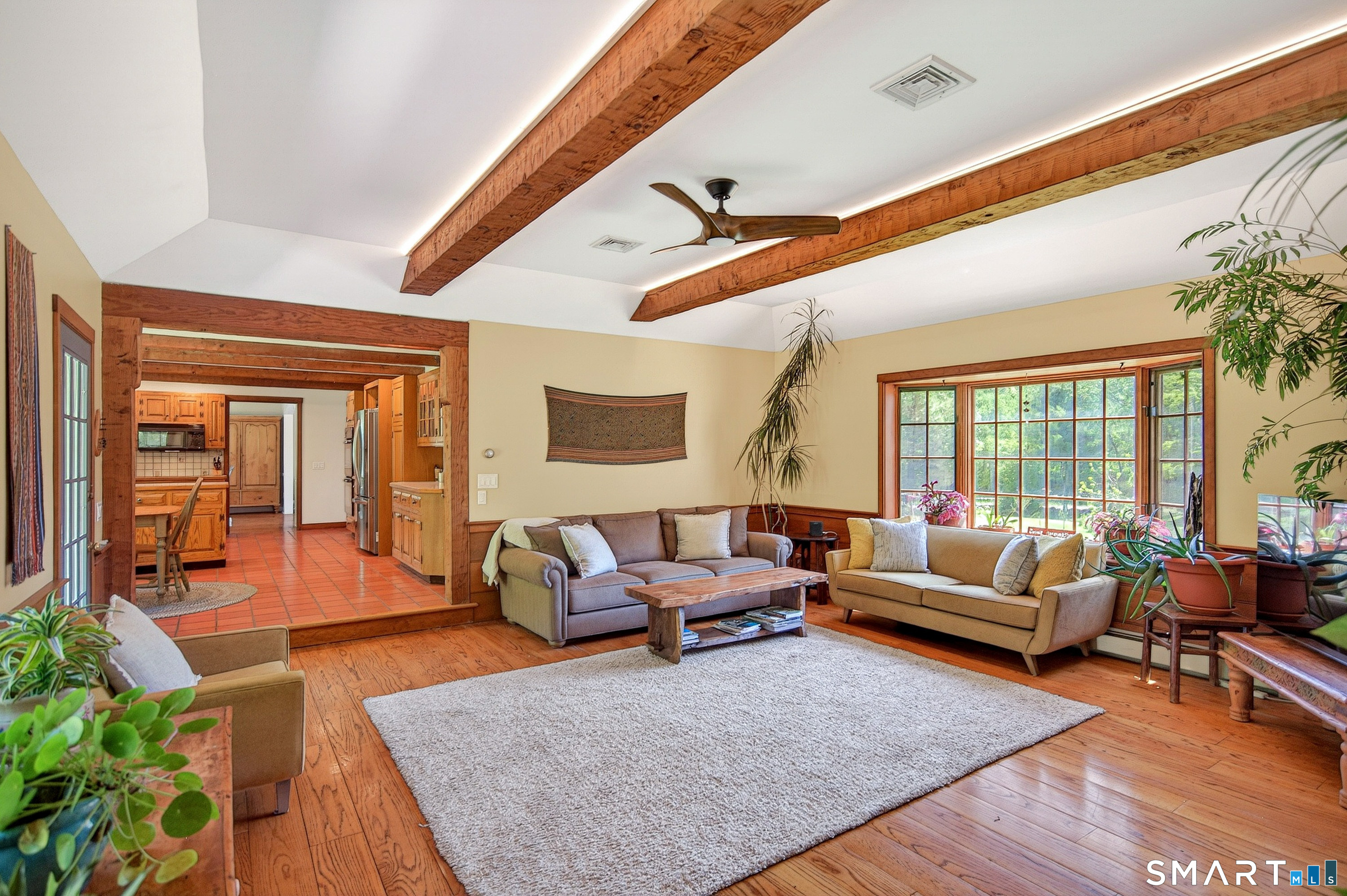 174 Huntingtown Road Newtown, CT 06470 - Photo 14 of 40 a living room with furniture and wooden floor