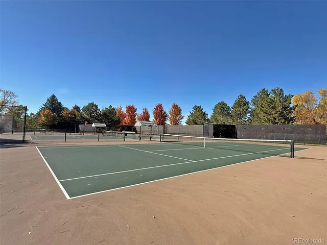 a view of a terrace with wooden fence