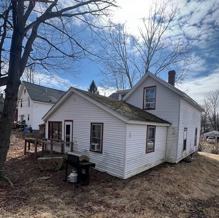10 Green Street Brookfield, MA 01506 - Photo 3 of 4 a view of a small house with a yard