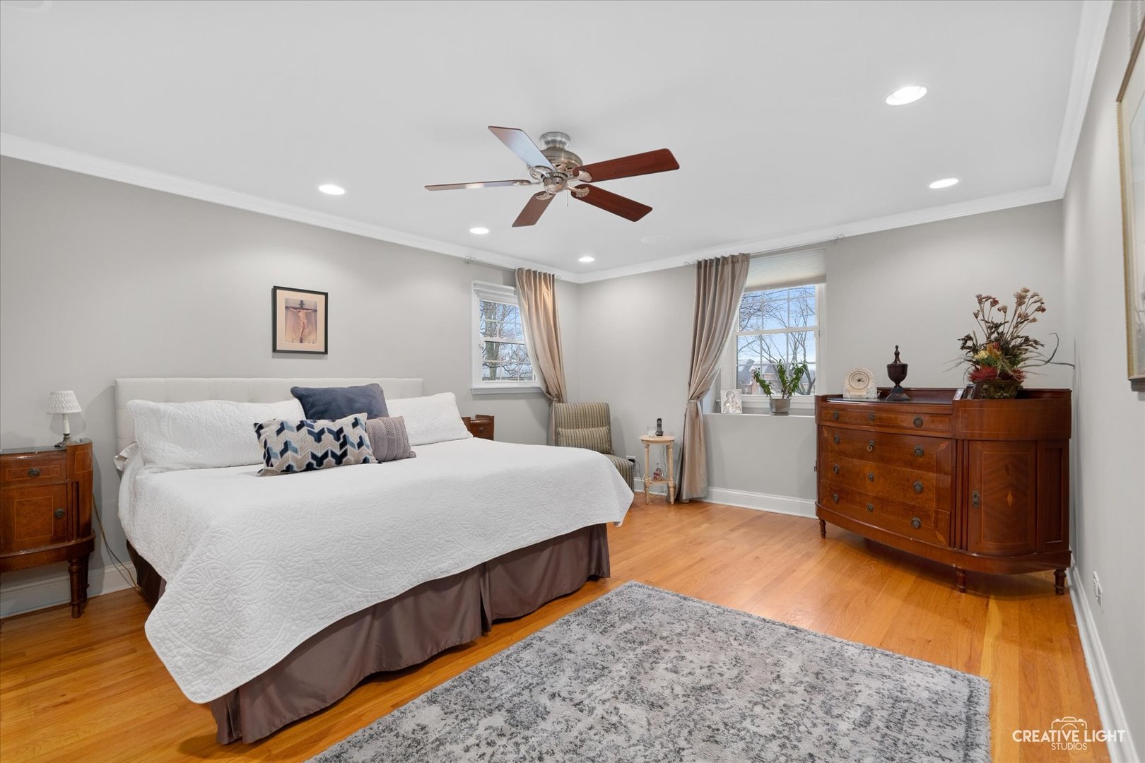 2S541 Seneca Drive Wheaton, IL 60189 - Photo 13 of 28 a bedroom with a bed and a dresser