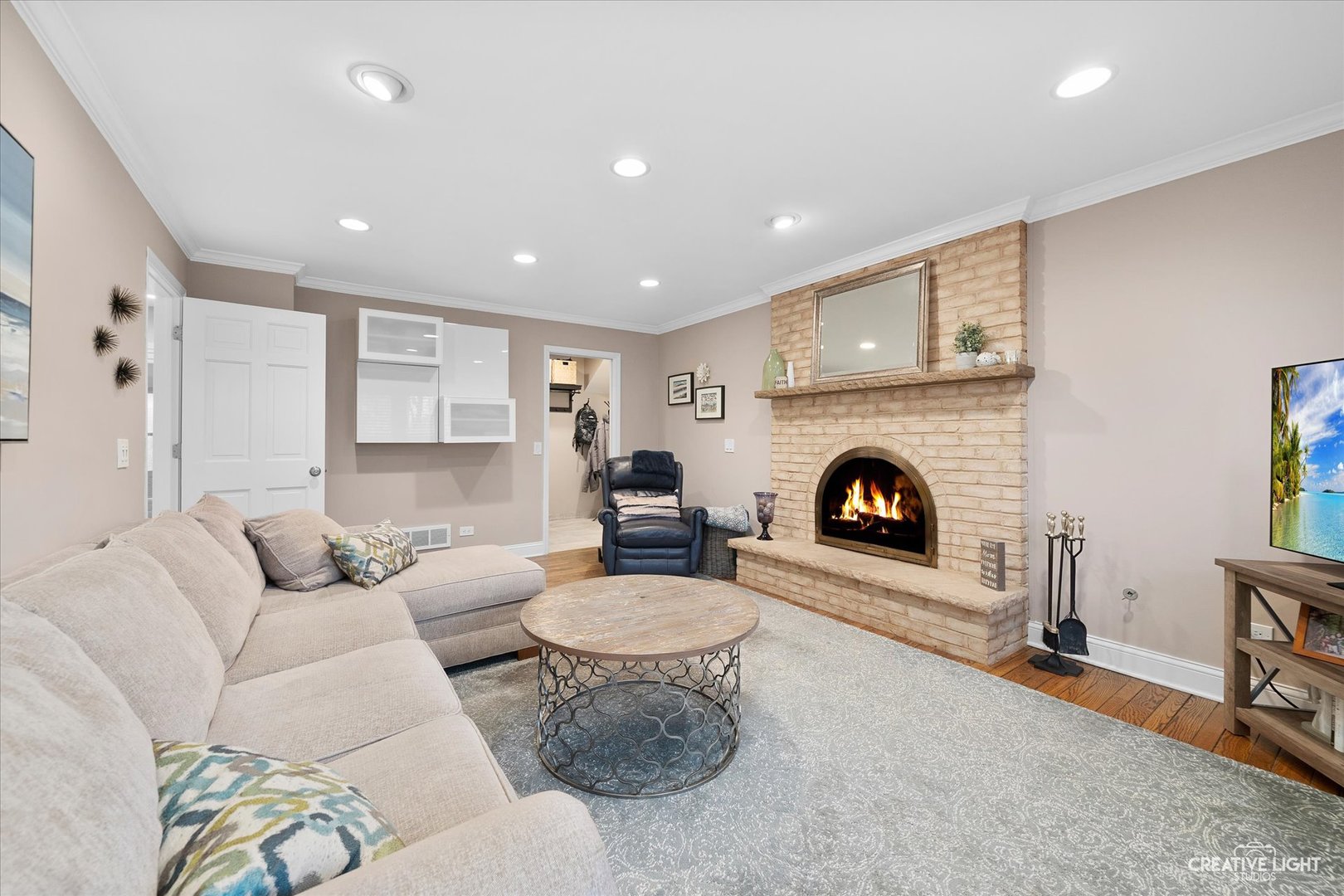 2S541 Seneca Drive Wheaton, IL 60189 - Photo 2 of 28 a living room with furniture and a fireplace