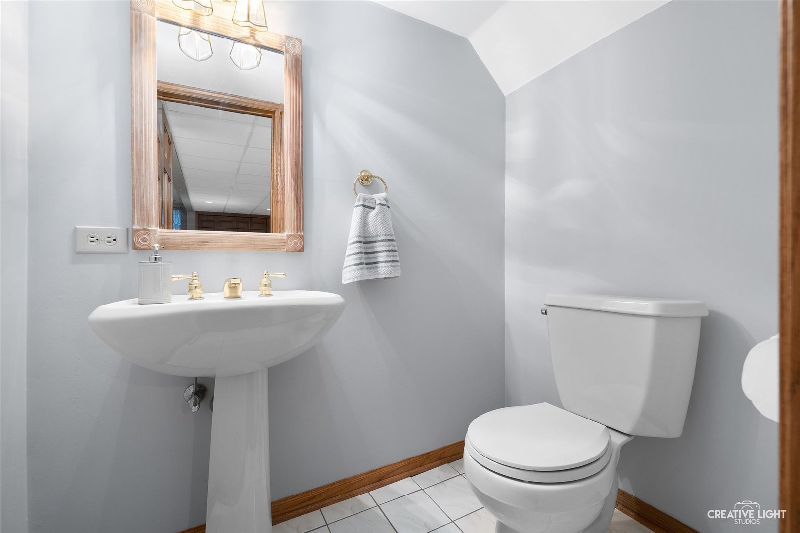 2S541 Seneca Drive Wheaton, IL 60189 - Photo 21 of 28 a bathroom with a sink toilet and mirror