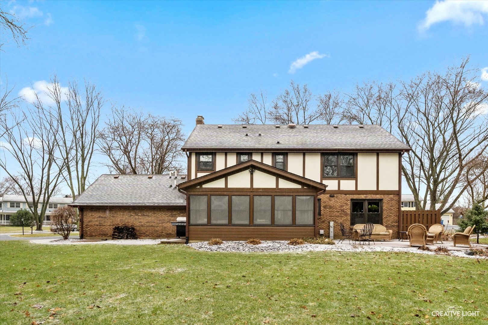 2S541 Seneca Drive Wheaton, IL 60189 - Photo 25 of 28 a front view of a house with a yard