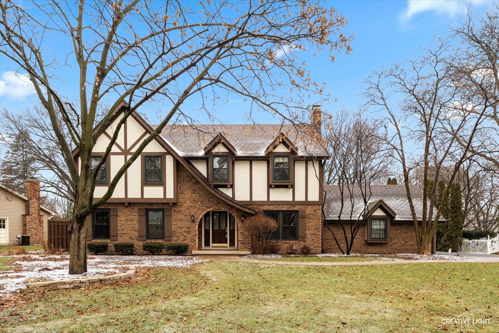 2S541 Seneca Drive Wheaton, IL 60189 - Photo 27 of 28 a front view of a house with a yard
