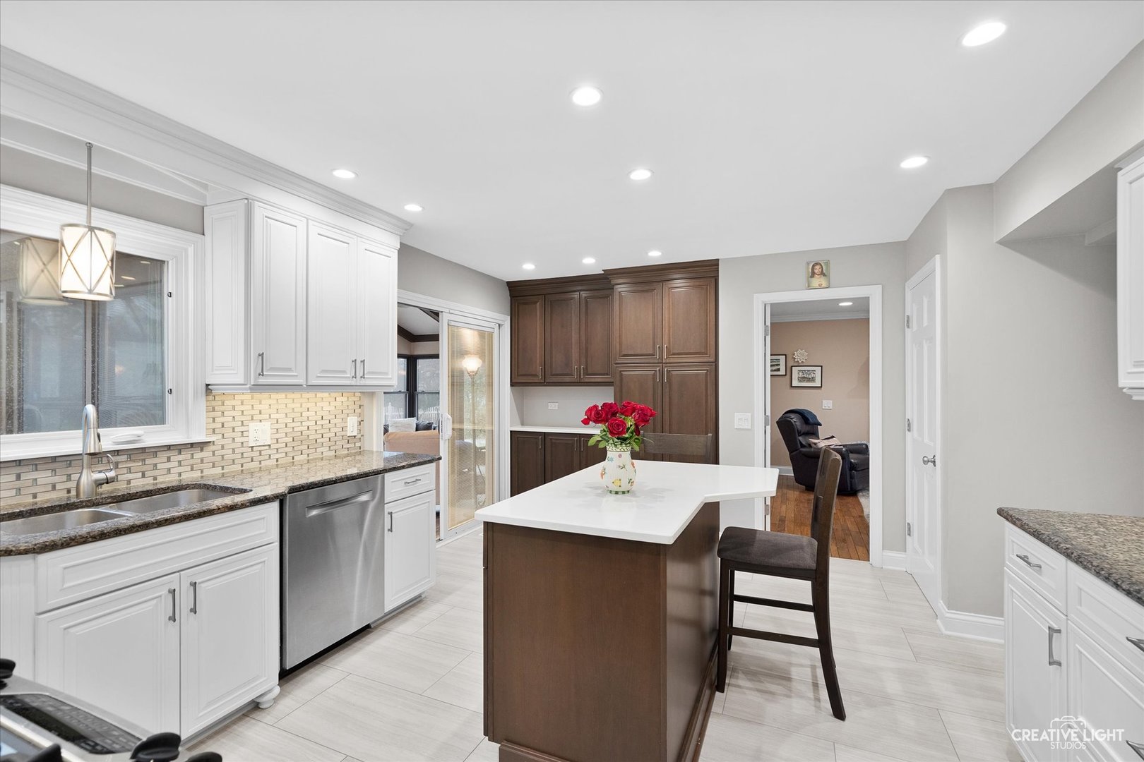 2S541 Seneca Drive Wheaton, IL 60189 - Photo 7 of 28 a kitchen with a sink a counter space appliances and cabinets