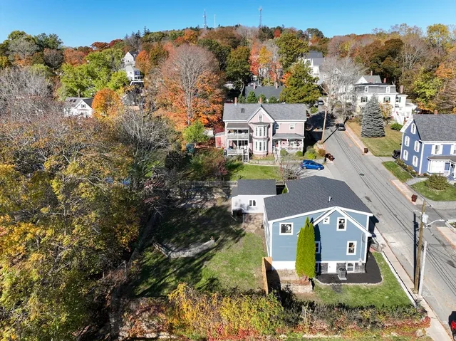 an aerial view of a house with a garden