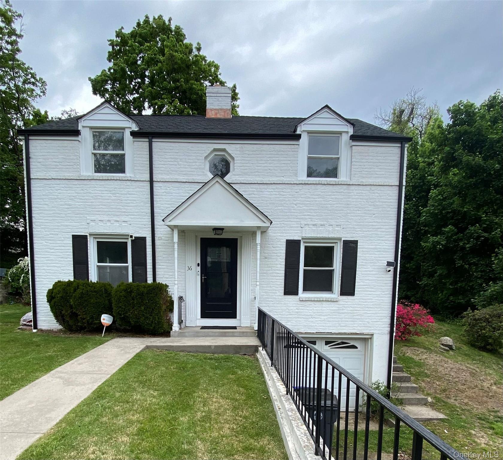 36 Maryton Road White Plains, NY 10603 - Photo 1 of 5 a front view of house with yard and green space