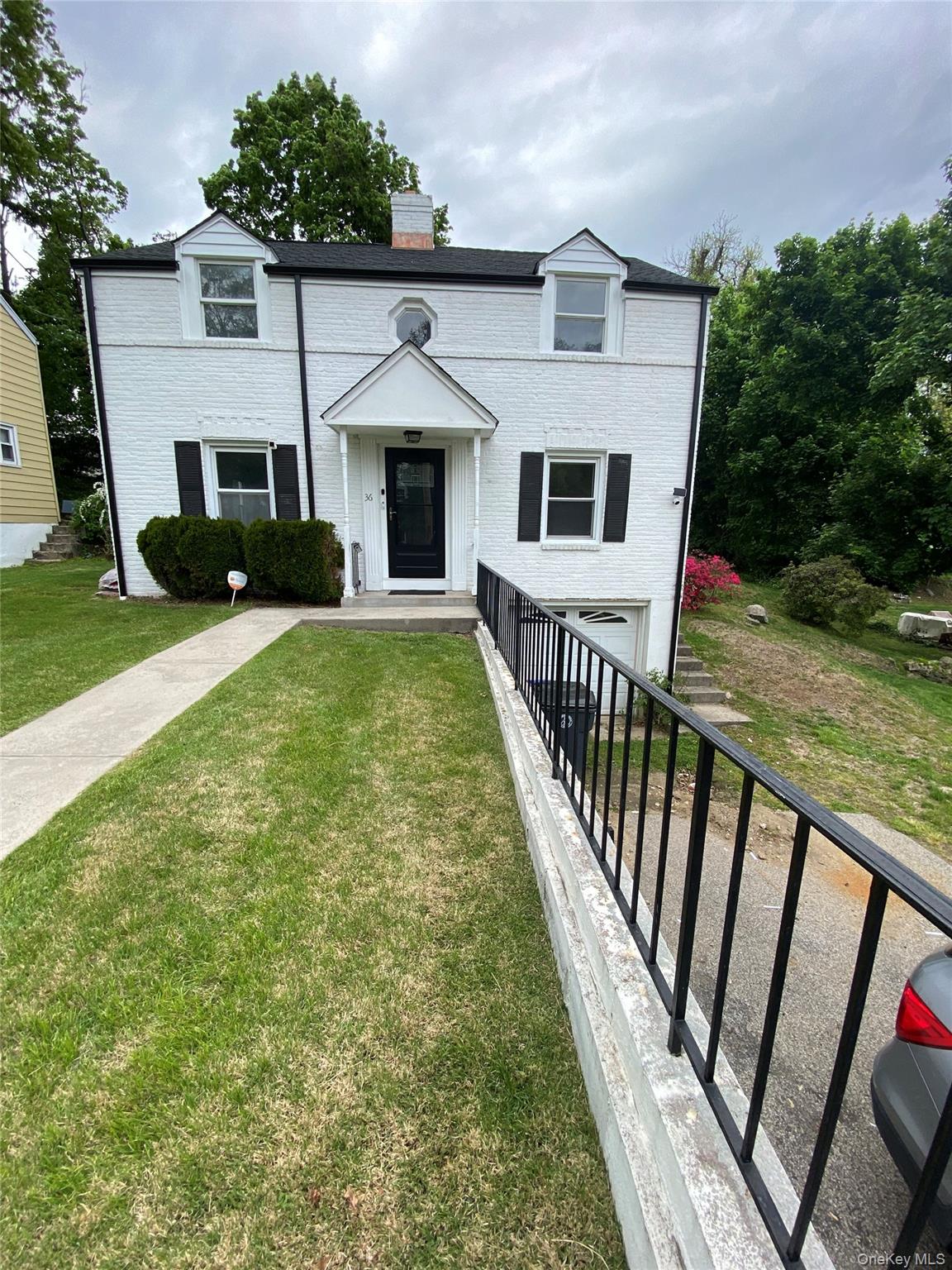 36 Maryton Road White Plains, NY 10603 - Photo 5 of 5 a front view of a house with yard