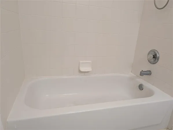 a close up of a bathtub in a bathroom