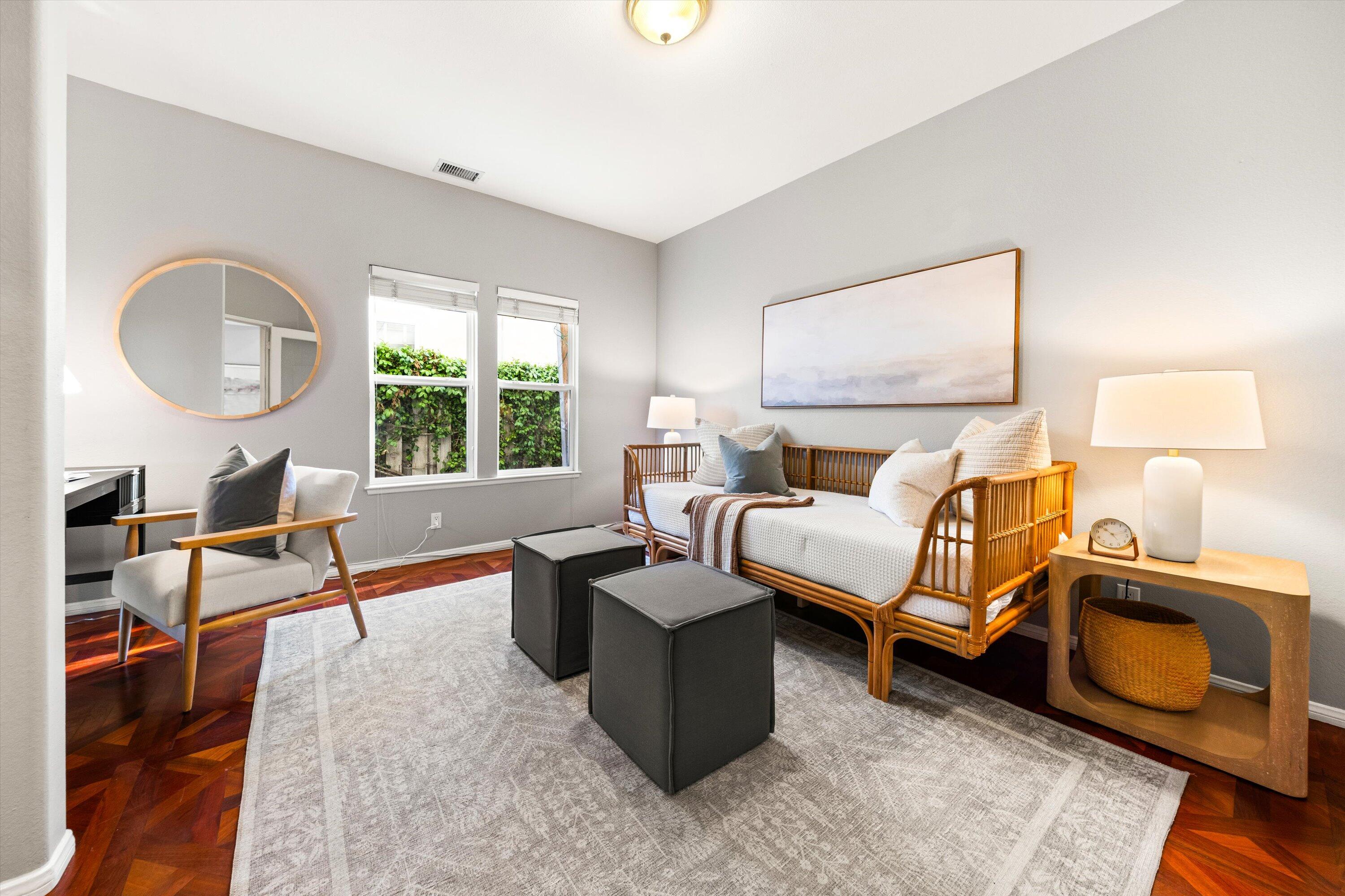 7926 Winchester Circle Goleta, CA 93117 - Photo 29 of 56 a living room with furniture a window and a lamp