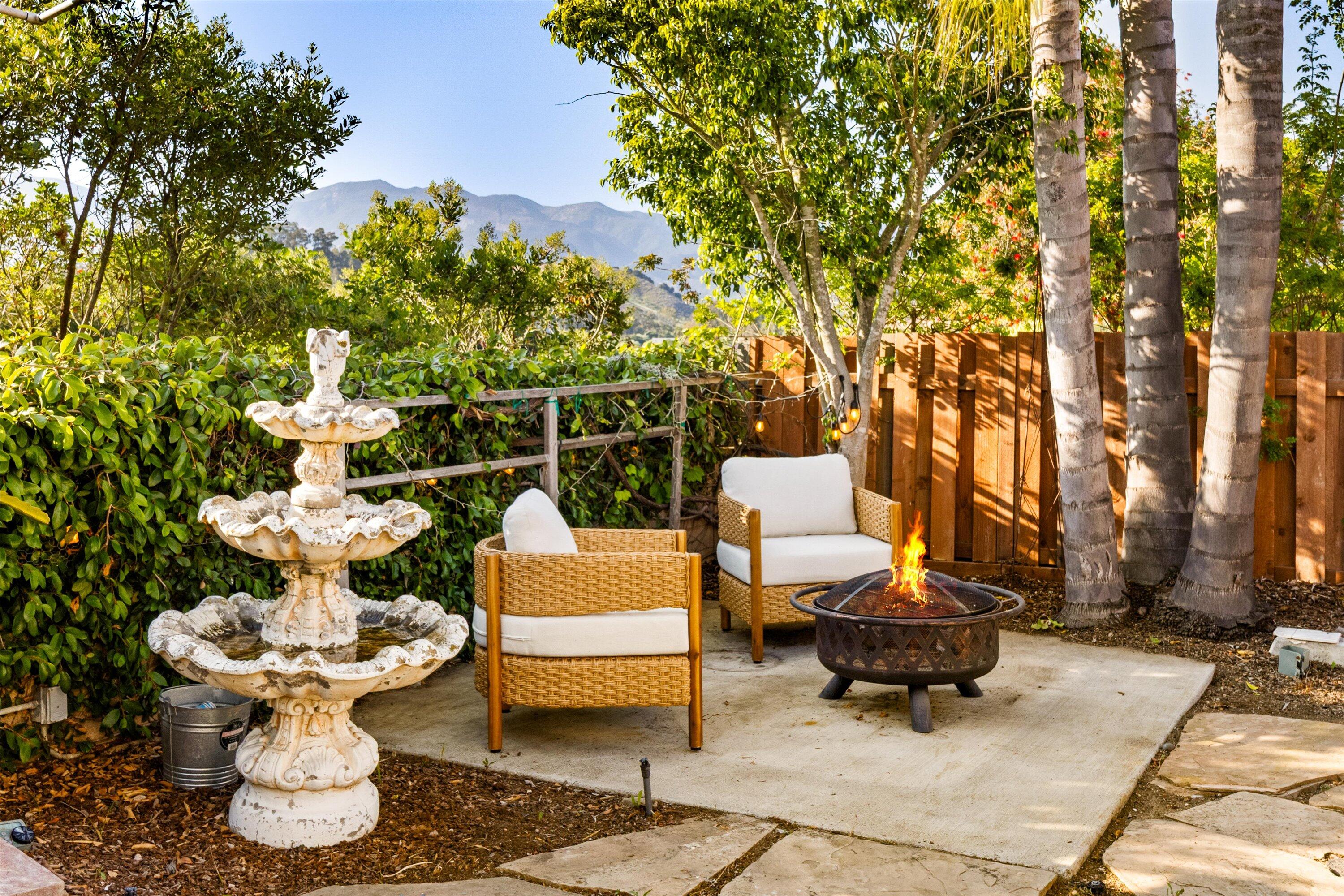 7926 Winchester Circle Goleta, CA 93117 - Photo 35 of 56 a view of a patio with table and chairs and potted plants