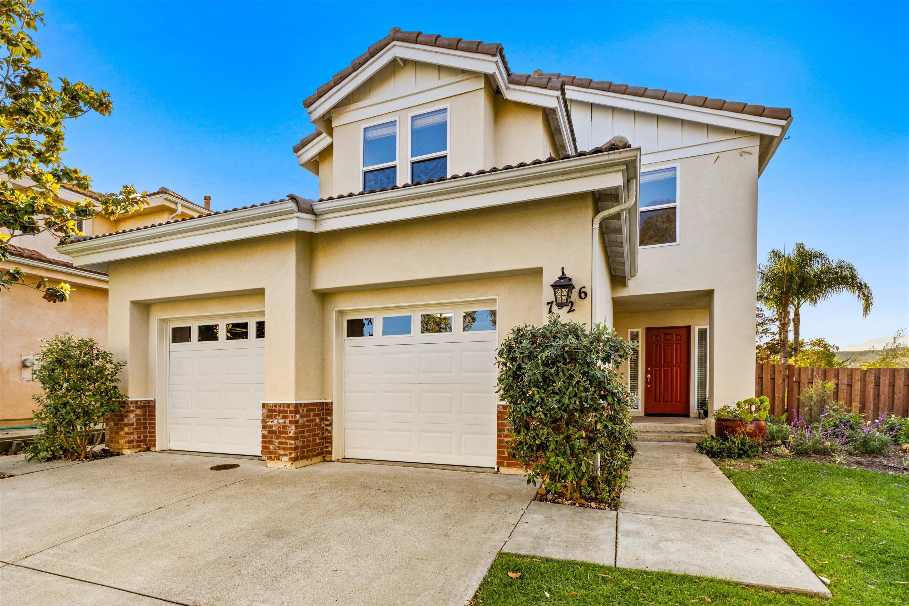 7926 Winchester Circle Goleta, CA 93117 - Photo 4 of 56 a front view of a house with garden