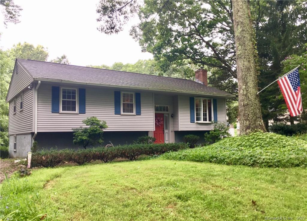 31 Brickyard Road Clinton, CT 06413 - Photo 1 of 1 a front view of a house with garden
