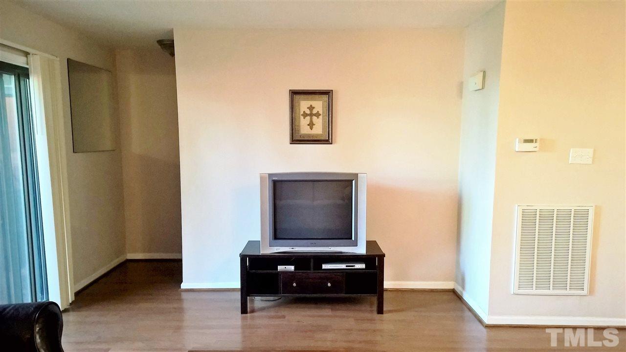 4269 Lake Ridge Drive Raleigh, NC 27604 - Photo 3 of 21 a living room with furniture and a window