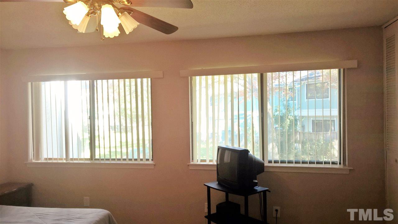 4269 Lake Ridge Drive Raleigh, NC 27604 - Photo 10 of 21 a room with furniture and windows