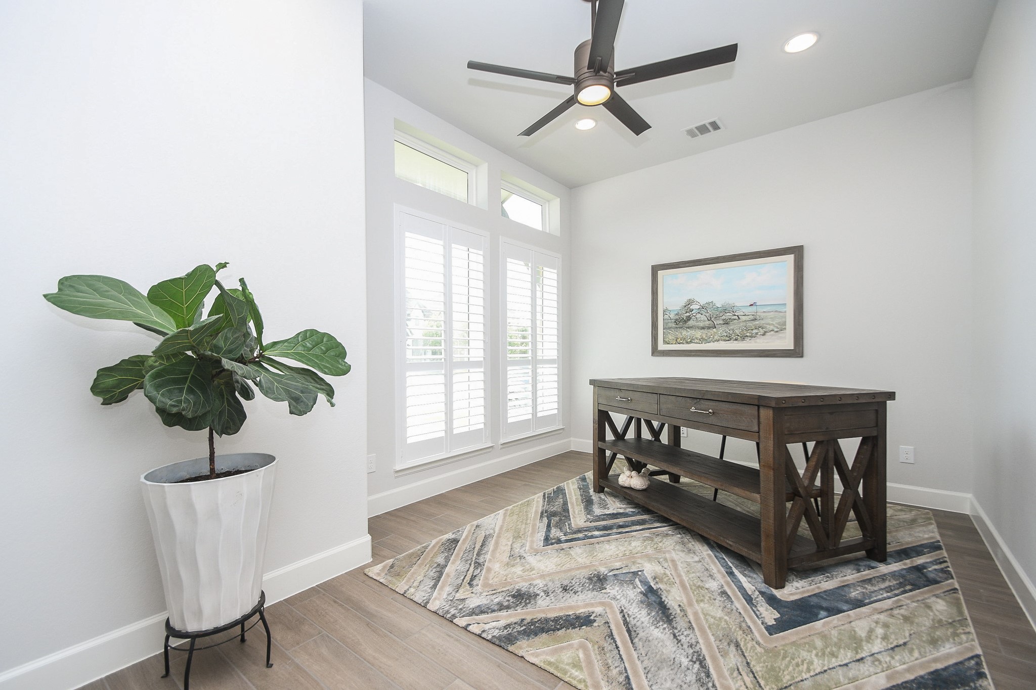 30314 Brook Point Fulshear, TX 77441 - Photo 4 of 38 Spacious and bright study has French doors and custom shutters at entry of home.