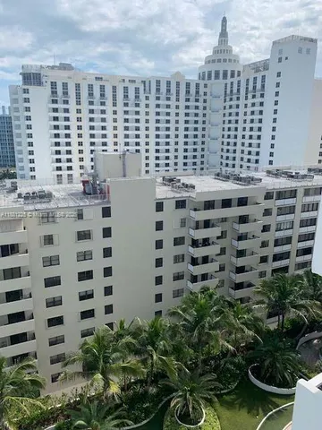 a view of a city with tall buildings