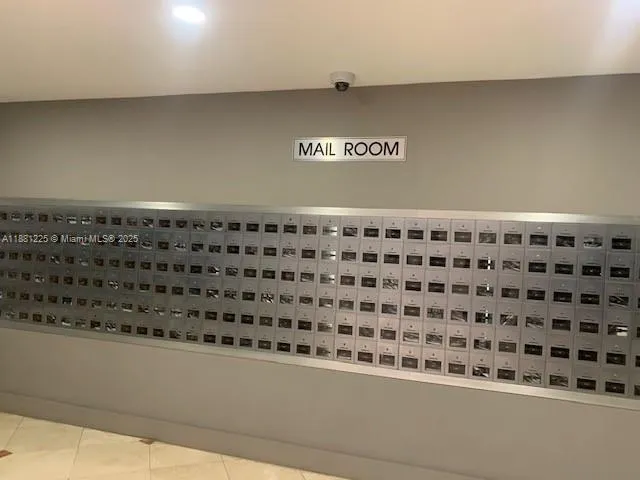 a bathroom with a black white checkered floor