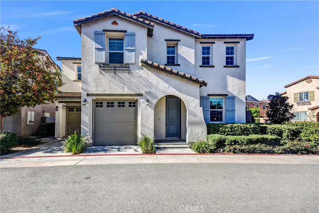front view of a house with a street