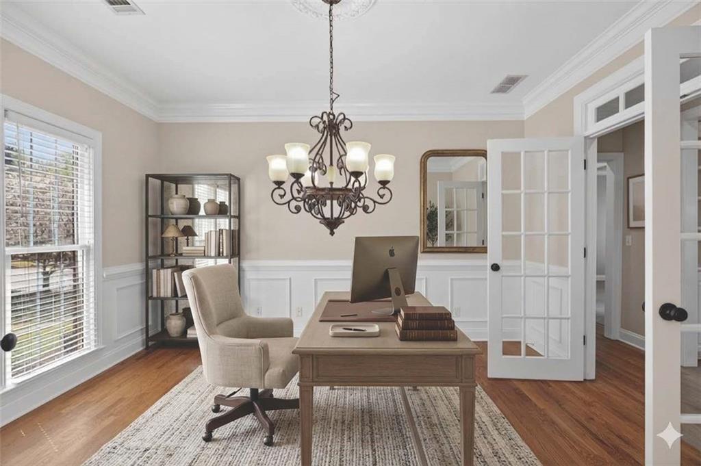 129 Oak Walk Villa Rica, GA 30180 - Photo 12 of 78 a view of a dining room with furniture and wooden floor