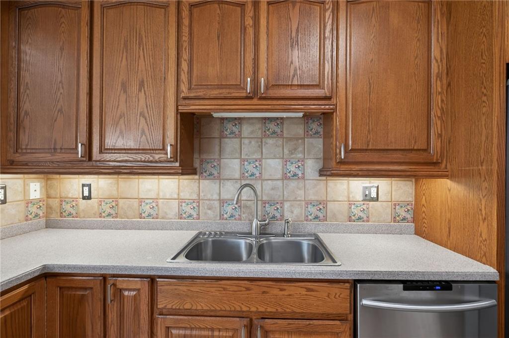 129 Oak Walk Villa Rica, GA 30180 - Photo 23 of 78 a kitchen with a sink and cabinets