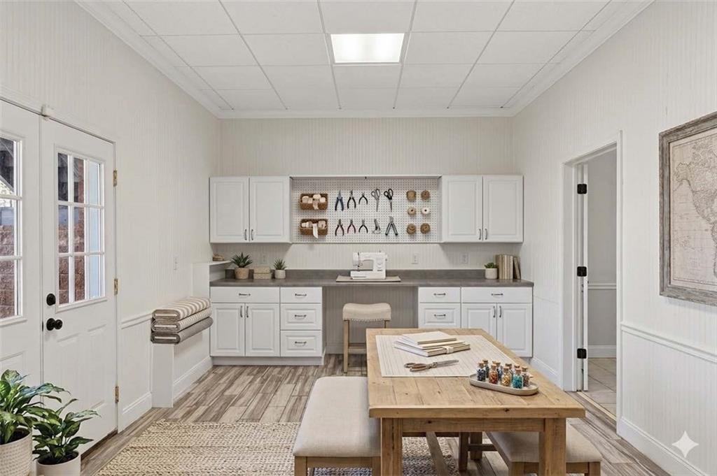 129 Oak Walk Villa Rica, GA 30180 - Photo 44 of 78 a kitchen with granite countertop white cabinets and white appliances