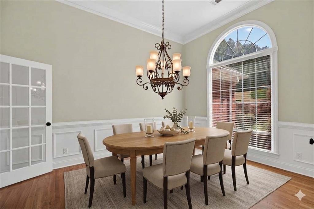 129 Oak Walk Villa Rica, GA 30180 - Photo 10 of 78 a view of a dining room with furniture window and wooden floor