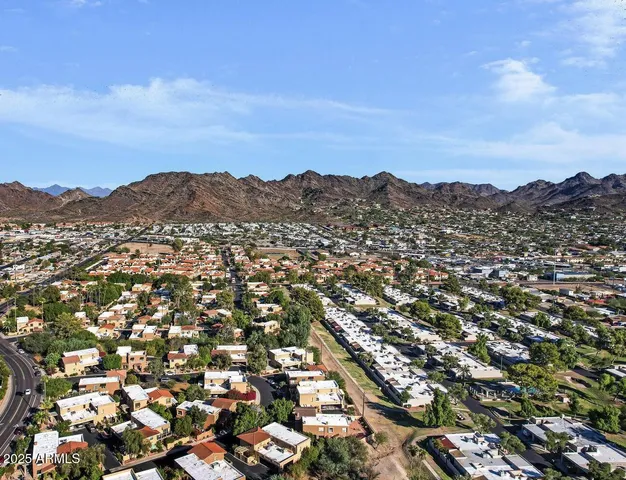 an aerial view of residential house with parking space