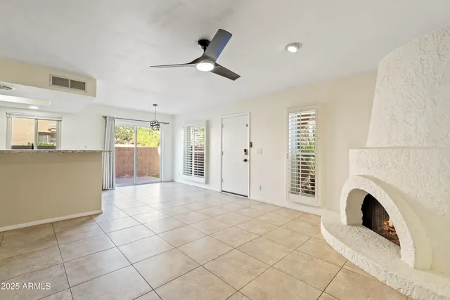 a view of livingroom with furniture and fireplace