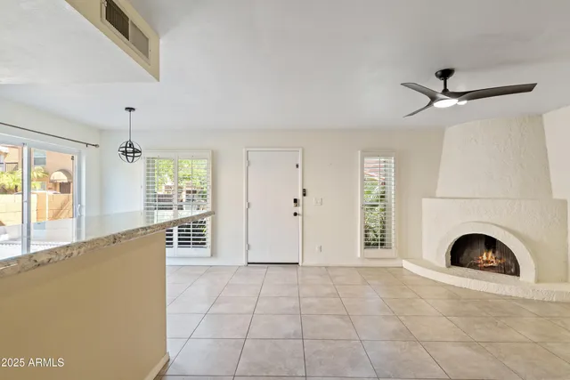 a view of livingroom with furniture window and fireplace