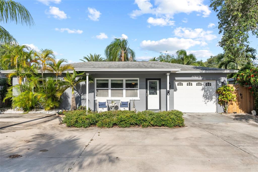 4929 100th Way North St. Petersburg, FL 33708 - Photo 1 of 1 a front view of a house with a porch