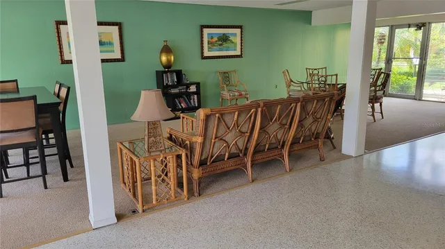 a bedroom with furniture and window