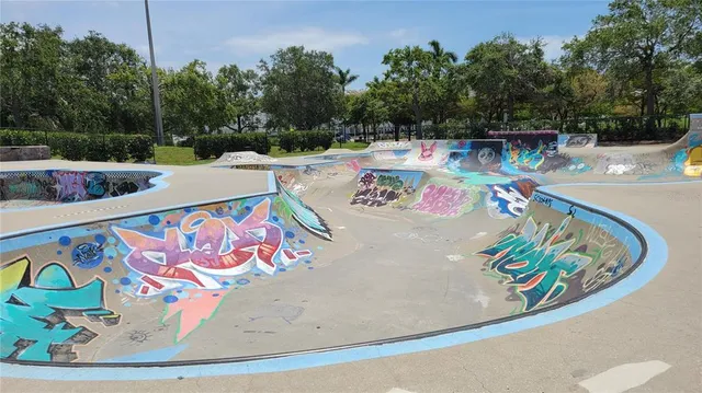a view of a park with plants and trees