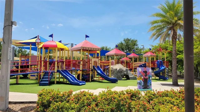 a view of a lake with a house in the background