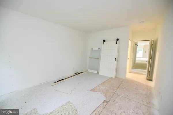 wooden floor and window in a room