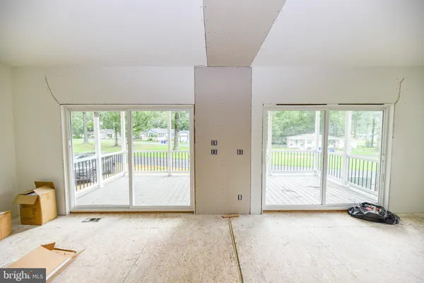 a view of a room with a large window