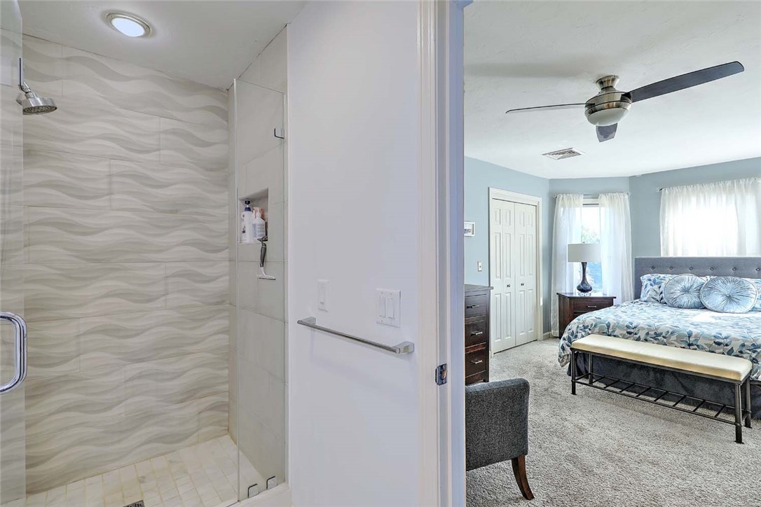 1 Anvil Drive Cumberland, RI 02864 - Photo 35 of 50 Primary suite shower and bedroom