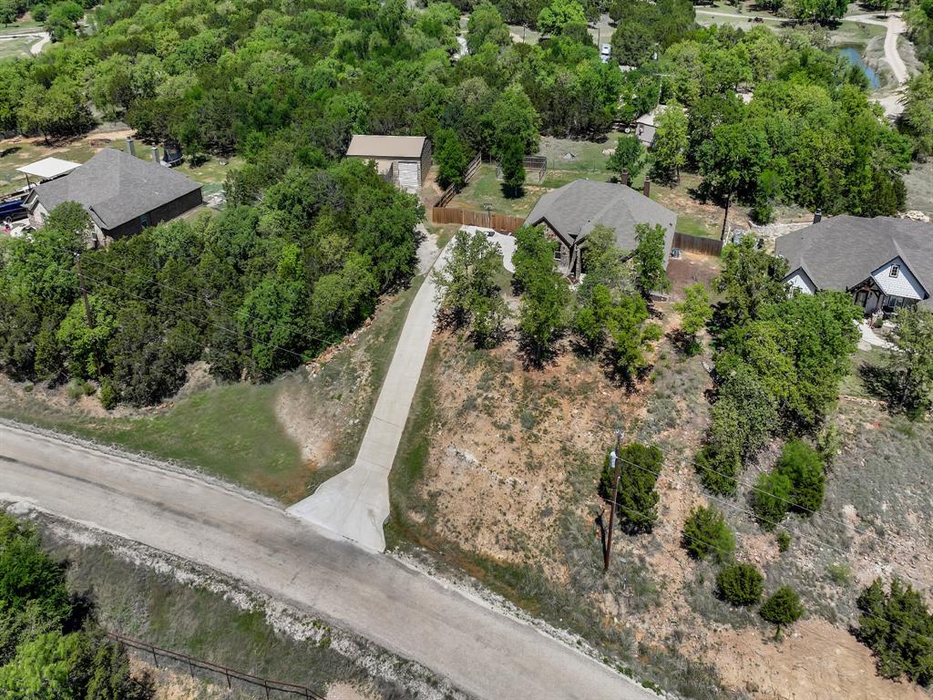 156 Cottongame Road Weatherford, TX 76088 - Photo 30 of 35 an aerial view of a house with a yard and outdoor seating