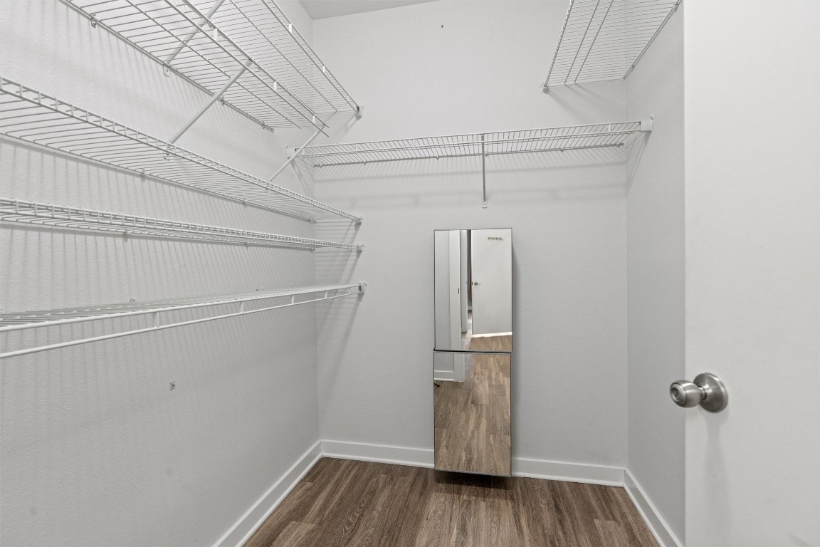 1900 Barton Springs Road, Unit 4037 Austin, TX 78704 - Photo 16 of 34 a view of a room with wooden floor