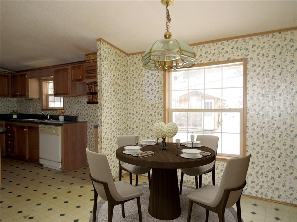 121 Hoy Run Road Spraggs, PA 15362 - Photo 11 of 25 a view of a dining room with furniture and chandelier